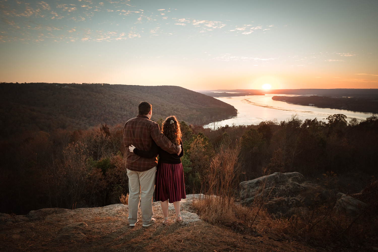 Couple staring at the sunset in a photography session with Andrea Angles Photography in Madison Alabama